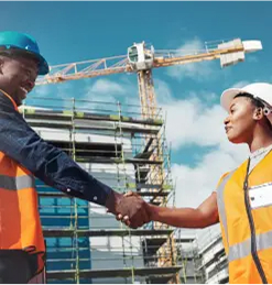 Team shaking hands on a jobsite